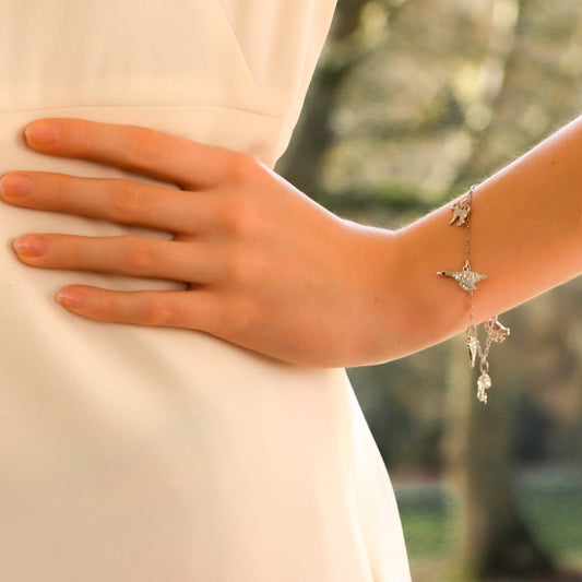 Vintage 1950s Animal Platinum Charm Bracelet with 1.03ct Diamonds and Rubies