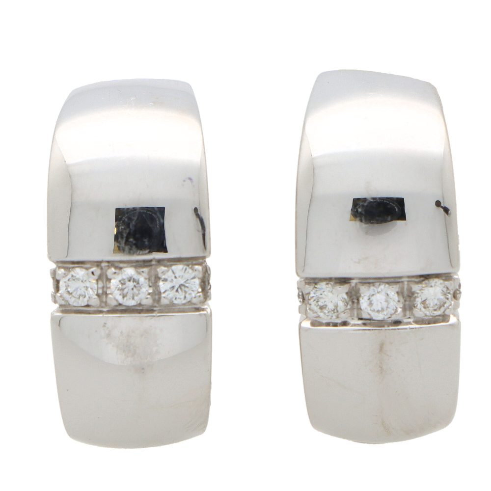 Vintage Mauboussin Paris diamond chunky huggie hoop earrings in white gold.