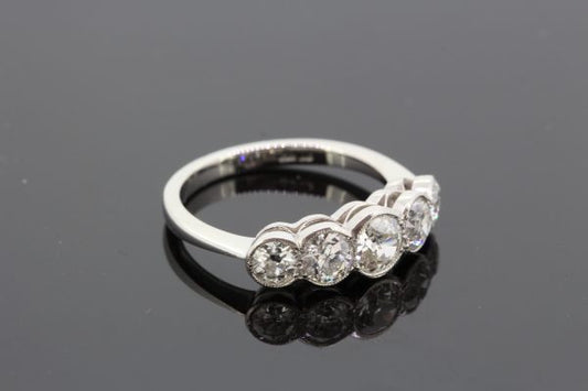 Five Stone Diamond Ring in Platinum, 1.60 carat total, featuring five graduated diamonds in collet settings and mounted in platinum