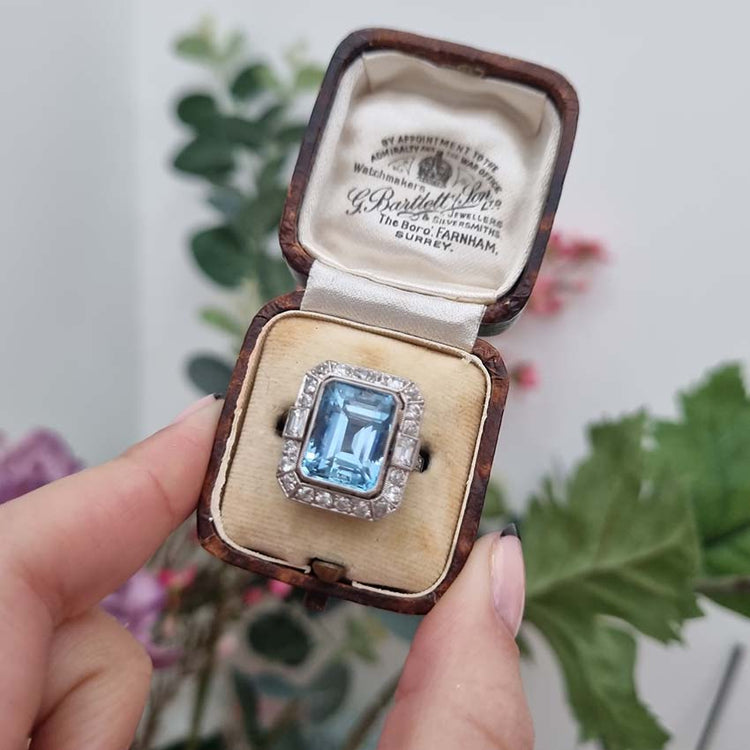 Vintage Santa Maria Aquamarine and Diamond Cluster Dress Ring, intense blue emerald-cut aquamarine millegrain set within 1ct old-cut diamond border in platinum