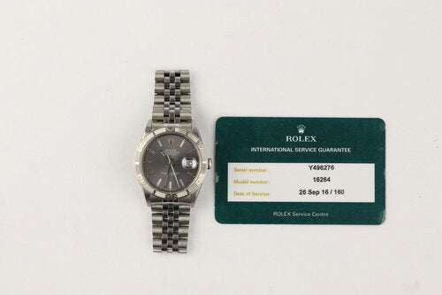 Rolex Datejust Turn-O-Graph Watch, 36mm; rotating bezel, grey dial, date indicator and sapphire crystal, automatic movement, stainless steel, Jubilee bracelet with fold over clasp, With Rolex service card.