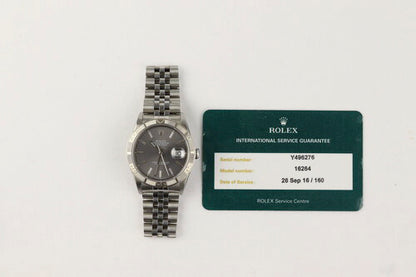 Rolex Datejust Turn-O-Graph Watch, 36mm; rotating bezel, grey dial, date indicator and sapphire crystal, automatic movement, stainless steel, Jubilee bracelet with fold over clasp, With Rolex service card.