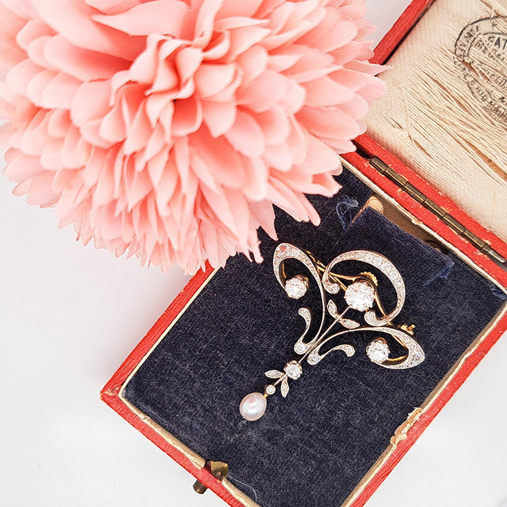 Antique Art Nouveau 1.60ct Old Cut Diamond and Pearl Pendant come Brooch in platinum upon yellow gold. Circa 1870