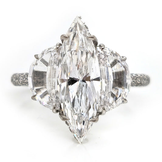 Fine Marquise Diamond Ring with Half Moon Shoulders, 1.67ct marquise-cut diamond flanked by a half moon diamond either side in platinum with single cut diamonds set to the gallery and three outer edges of the shank