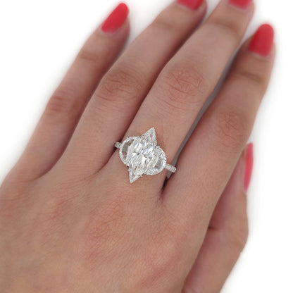 Fine Marquise Diamond Ring with Half Moon Shoulders, 1.67ct marquise-cut diamond flanked by a half moon diamond either side in platinum with single cut diamonds set to the gallery and three outer edges of the shank