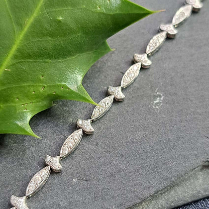 Diamond Fleur De Lis Style Bracelet in 18ct Gold