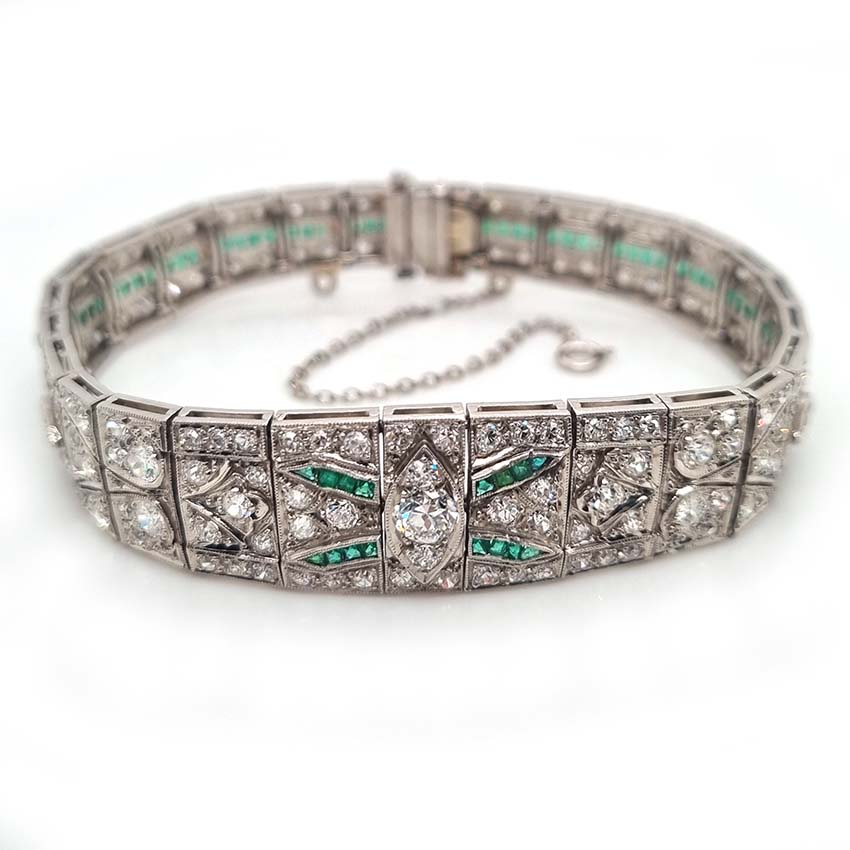 Art Deco 5ct Old Cut Diamond and Emerald Bracelet in Platinum, 5cts of old European transitional-cut diamonds accented with fine baguette-cut and French-cut emeralds