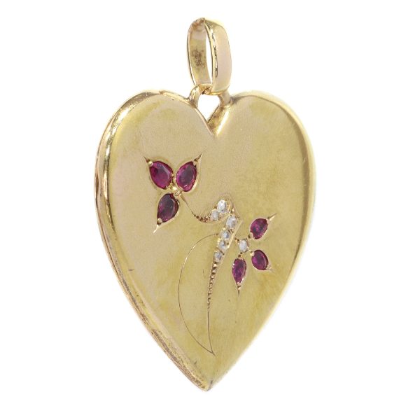Victorian gold heart shaped locket set with diamonds and rubies