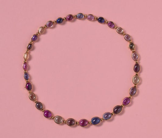 Vintage Bulgari Multi Colour Sapphire Necklace; 71.25cts, oval cabochon sapphires mounted in 18ct yellow gold, can be worn as two bracelets, signed Bvlgari