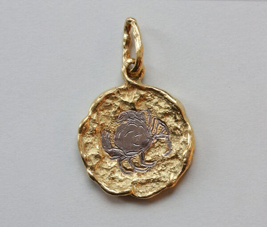 Vintage Chaumet 18ct Gold Cancer Horoscope Pendant; with a brutalist textured finish. Signed: Chaumet, Paris, France, circa 1970.