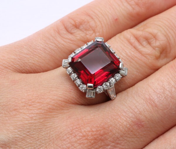 Bailey, Banks and Biddle Vintage Rubelite, Diamond and Platinum Square Ring; 12 carat step-cut rubelite bordered with mixed-cut diamonds, Signed, Circa 1950