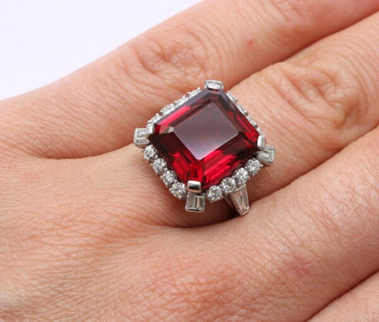 Bailey, Banks and Biddle Vintage Rubelite, Diamond and Platinum Square Ring; 12 carat step-cut rubelite bordered with mixed-cut diamonds, Signed, Circa 1950