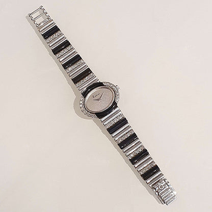 Vintage Kutchinsky Watch by Chopard with Onyx and Diamonds, 18ct white gold case and strap set with diamonds and black onyx. Circa 1970s