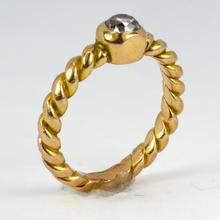 Old Cut Diamond Solitaire 18ct Gold Twisted Pinky Ring; 0.45 carat old mine-cut diamond collet set on a twisted 18ct yellow gold shank
