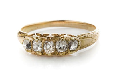 Antique Victorian Old Cut Diamond Five Stone Ring; set with five graduating old-cut diamonds, in 15ct yellow gold. Made in England, Circa 1860s