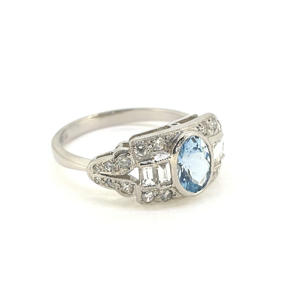 Oval Aquamarine and Diamond Cluster Ring