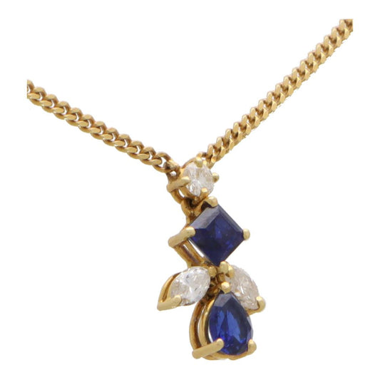 Sapphire and diamond pendant in 18 carat yellow gold