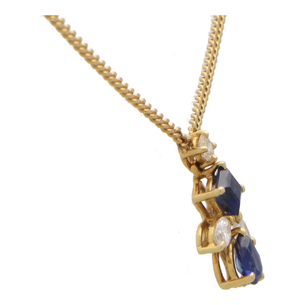 Sapphire and diamond pendant in 18 carat yellow gold