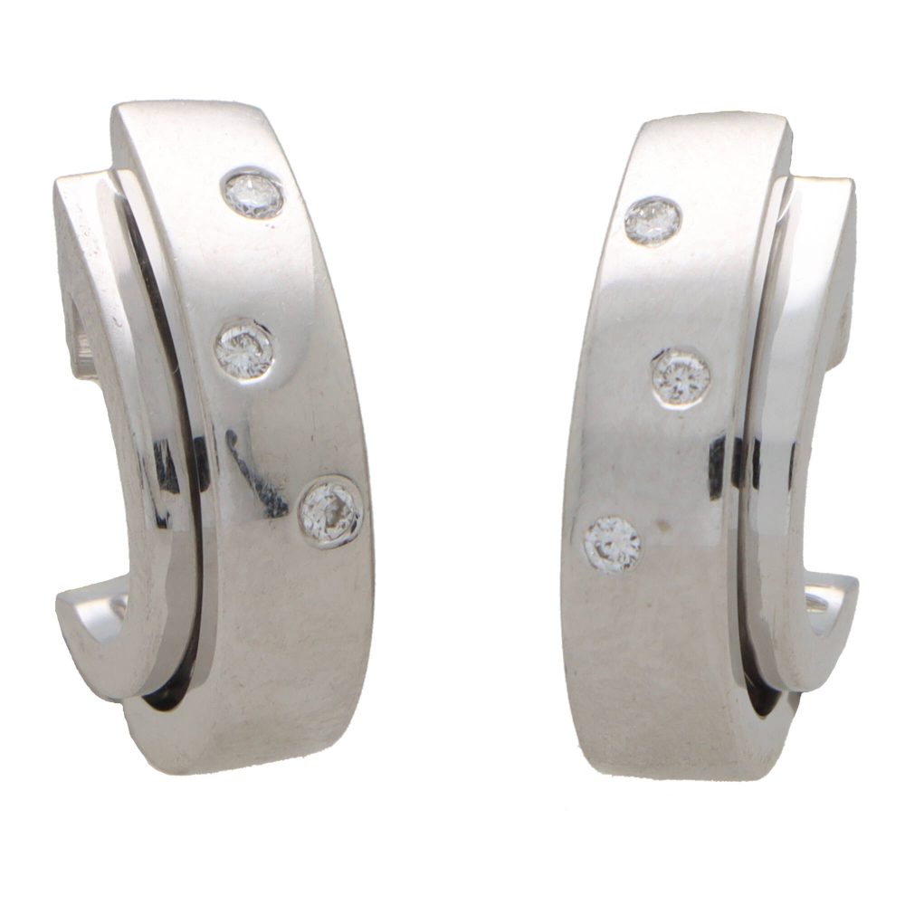 Piaget diamond hoop earrings in white gold.