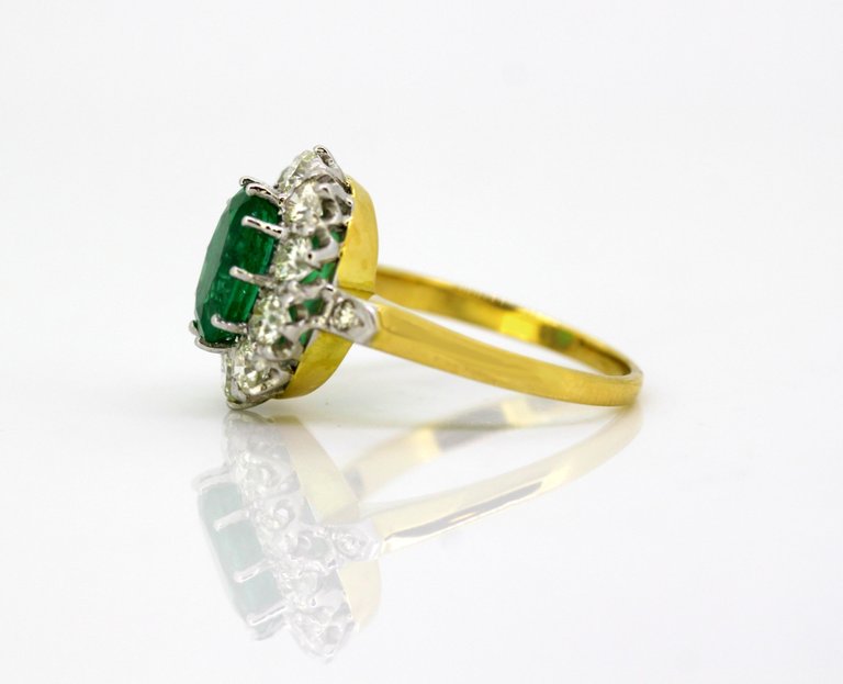 Vintage Emerald and Diamond Cluster Ring