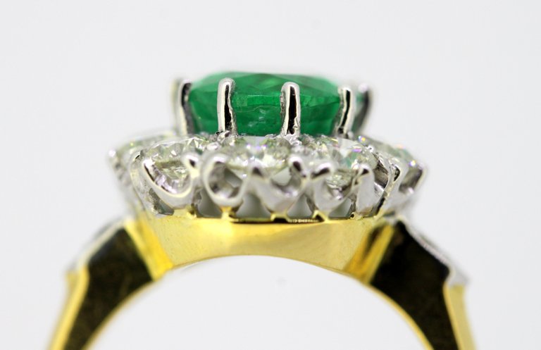 Vintage Emerald and Diamond Cluster Ring