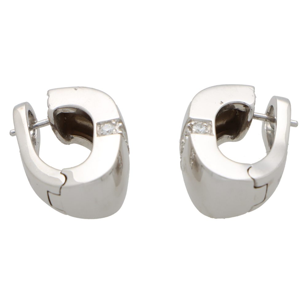 Vintage Mauboussin Paris diamond chunky huggie hoop earrings in white gold.