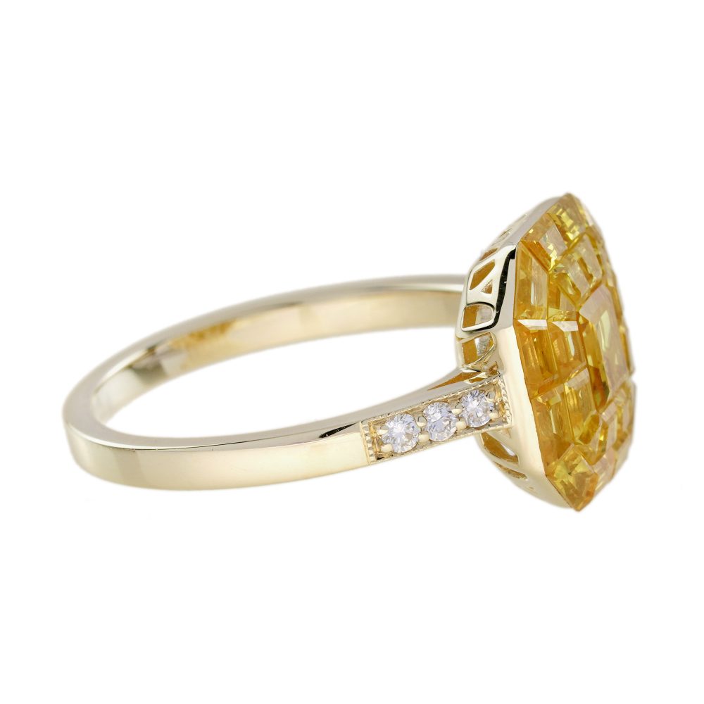 Yellow Sapphire Octagonal Cluster Solitaire Engagement Ring, 5.27cts yellow sapphires arranged in an invisible setting to produce an octagonal shaped design in 14ct yellow gold with diamond set shoulders