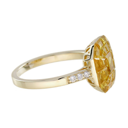 Yellow Sapphire Octagonal Cluster Solitaire Engagement Ring, 5.27cts yellow sapphires arranged in an invisible setting to produce an octagonal shaped design in 14ct yellow gold with diamond set shoulders