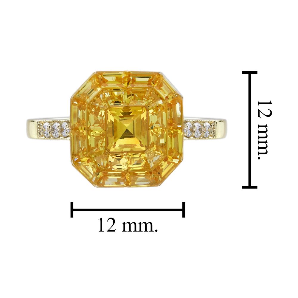 Yellow Sapphire Octagonal Cluster Solitaire Engagement Ring, 5.27cts yellow sapphires arranged in an invisible setting to produce an octagonal shaped design in 14ct yellow gold with diamond set shoulders